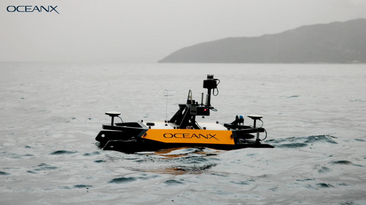 Left side view of the Otter USV vessel with the SeaSight add-on in the coastal ocean.